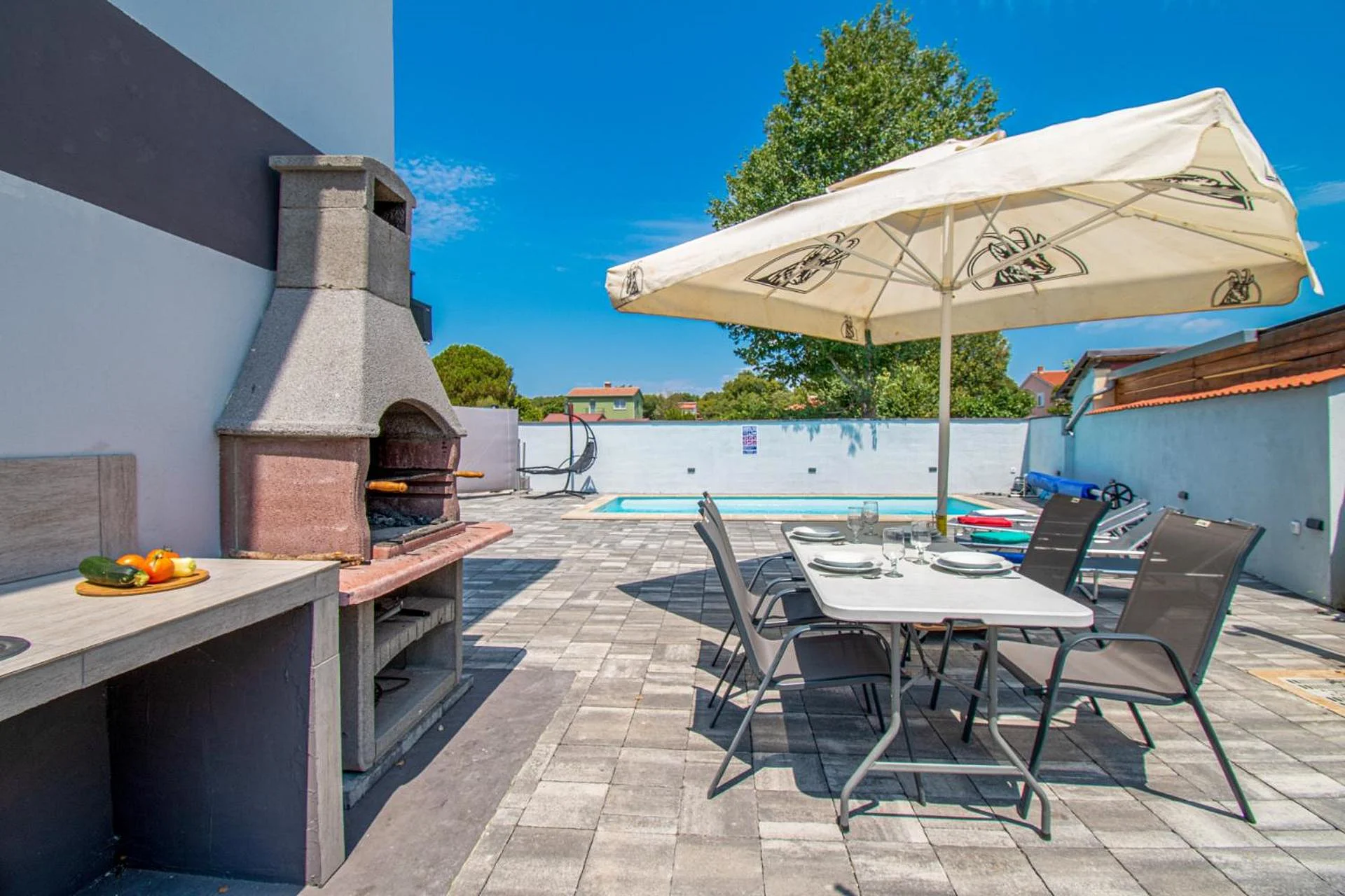 Private pool and outdoor dining terrace at Vila Damjan